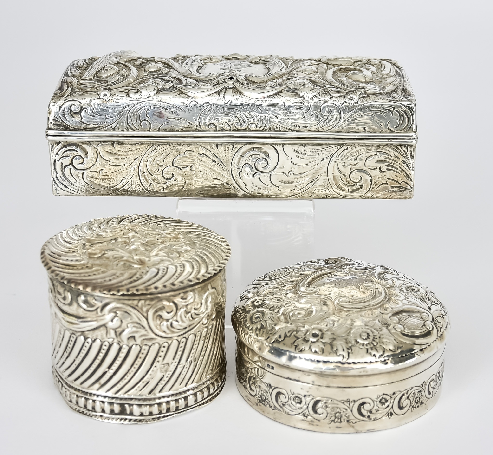 A Victorian Silver Rectangular Box and Two Silver Circular Boxes, the ...