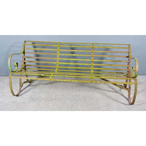 280 - A Wrought Iron Garden Bench, with slatted back and seat and scroll arm terminals, 71ins overall... 
