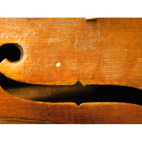 178 - c.1900 Violin with 2 piece back in case with bow
-bears a Stradivarius label inside
-length 59cm (23... 