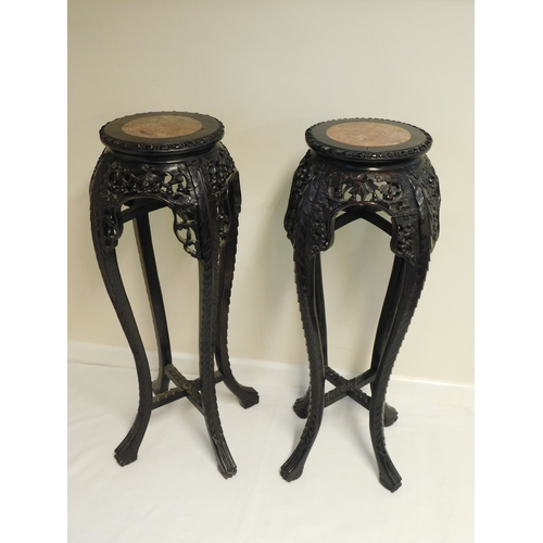 192 - Pair of Chinese matching hardwood stands with marble inset
-diameter of top 28cm (11