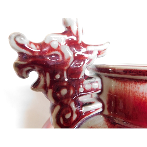 207 - Chinese stoneware vase with high fired red ground glaze & marked on base with 4 character mark
-heig... 