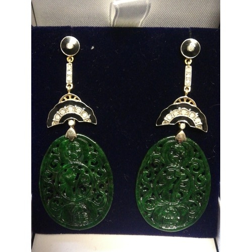 11 - Pair of silver & gold drop earrings set with large oval patterned jade, diamonds & black enamel