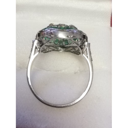 12 - Platinum emerald & diamond daisy style ring
-approx 0.95ct old cut diamonds & 1.45ct emeralds