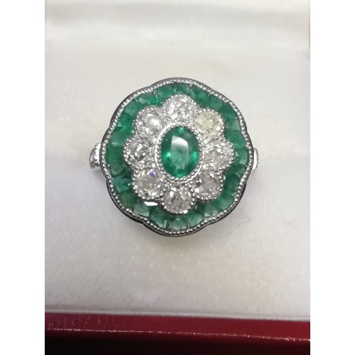12 - Platinum emerald & diamond daisy style ring
-approx 0.95ct old cut diamonds & 1.45ct emeralds