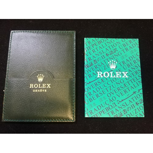 74 - Rolex oyster wallet + booklet dated 1985