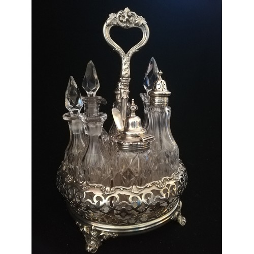 89 - Victorian (1864) silver & glass 7 bottle cruet stand (1 stopper missing) by William Evans