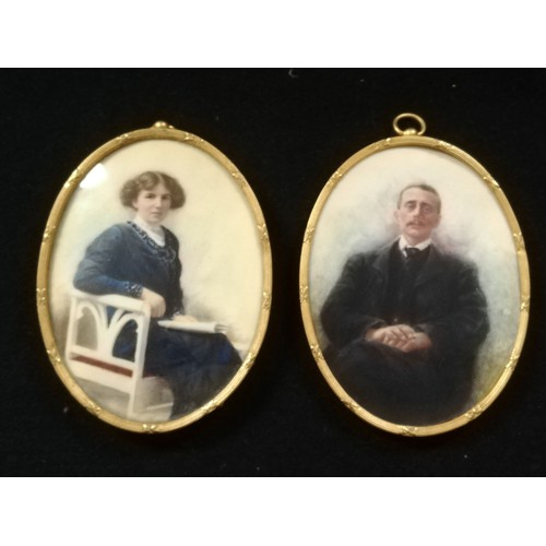 107 - Pair of oval gilt metal framed portrait miniatures on ivory of Edwardian lady & gentleman (1 lacks g... 