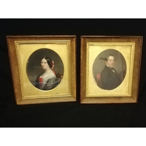 111 - Pair of 19th century portraits on board of a lady & gentleman in wooden frames with a velvet border ... 