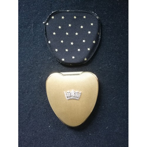 121 - Kigu Cherie heart shaped compact with naval crown embellishment & fabric sleeve