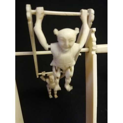 138 - Cantonese carved ivory toy with pair of acrobats