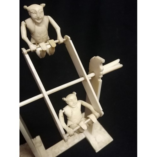 138 - Cantonese carved ivory toy with pair of acrobats