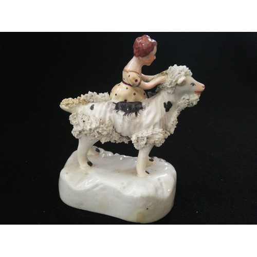 170 - Pair of hard paste Staffordshire figures of children riding goats
-largest 4