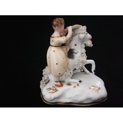 170 - Pair of hard paste Staffordshire figures of children riding goats
-largest 4