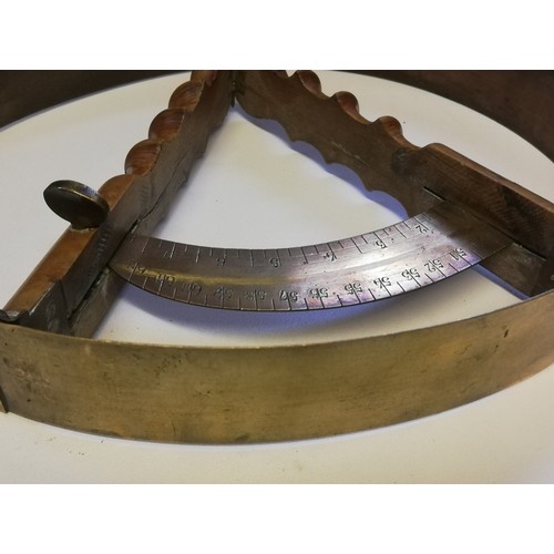 179 - Hat measurer made of brass & with walnut handles