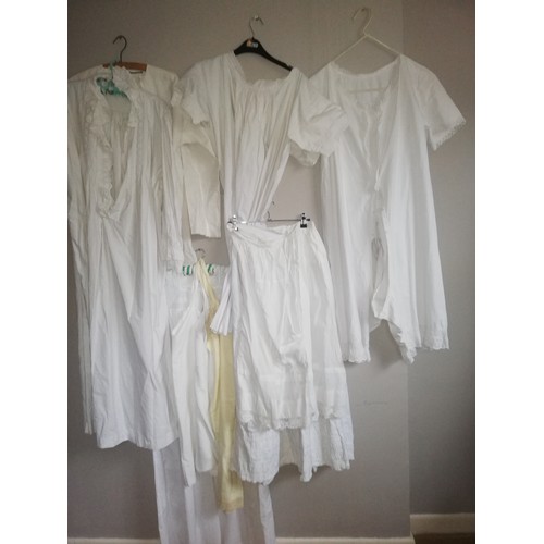 404 - Quantity of linen & lace nightwear / underwear inc 2 white petticoats, french linen smock, 1 short s... 