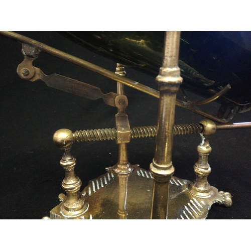 24 - Antique brass mechanical wine bottle pourer with pad feet (bottle not included) - height 14½