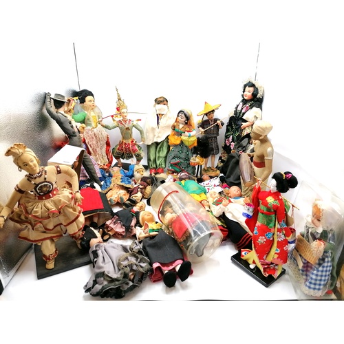 77 - Qty of vintage costume dolls from around the world