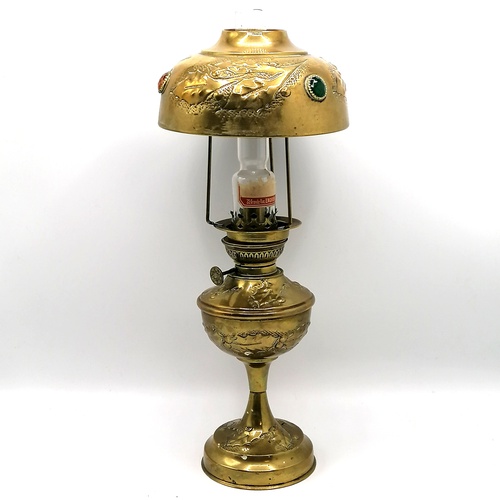 102 - Brass oil lamp with a metal & glass decorated shade - 16