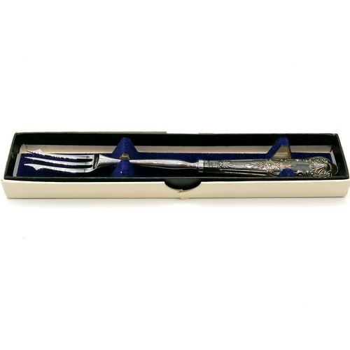 131 - Silver handled pickle fork in box t/w a plated bread fork