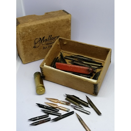 148 - Quantity of fountain pen nibs and a gilt metal nib box by CW Hughes