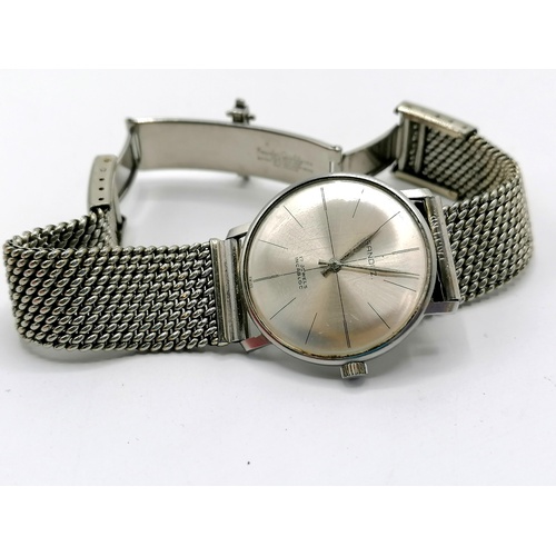 165 - Gents stainless steel Sandoz wristwatch on metal bracelet (running)