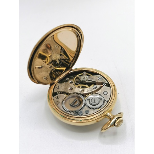 168 - Heavy gold plated ladies fob watch set with diamond to back case & 2 bird motif - running