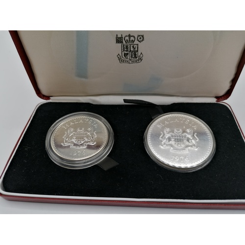 193 - 1976 Malaysia cased silver 15 & 25 Ringgit coins
(Malaysian Gaur & Rhinoceros hornbill)