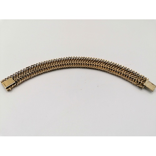 234 - 1973 9ct gold articulated bracelet by ML - 7¾