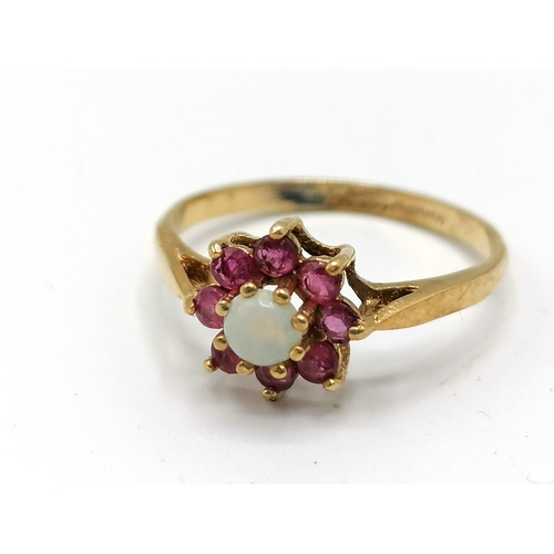 239 - 9ct gold opal & ruby ring