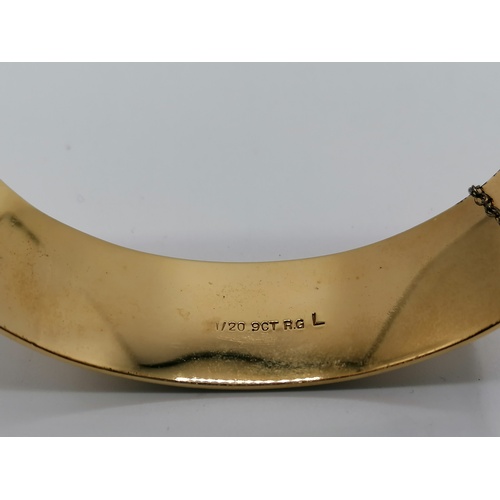 279 - Rolled gold bangle, boxed. weight 52g.