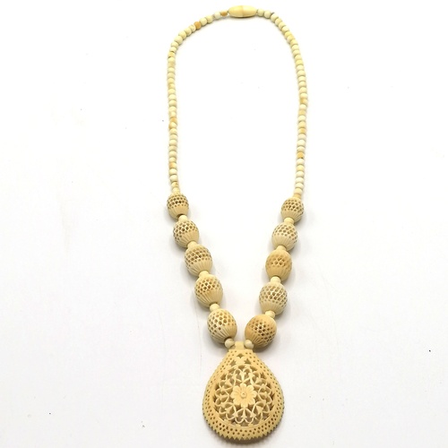 313 - Antique pierced carved ivory bead necklace (16