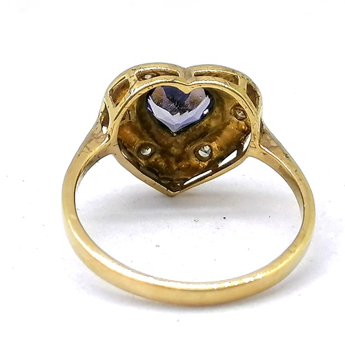 321 - 9ct heart shaped tanzanite and diamond ring
-the tanzanite is approx 1ct & surrounded by 6 diamonds
... 