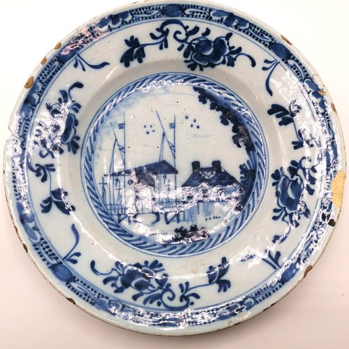 11 - 18thC Dutch Delft plate depicting a harbour scene 9¼