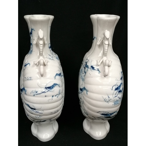 19 - Pair of white grounded moon flask vases with dragon handles & crayfish decorated bodies by Jiangxi P... 