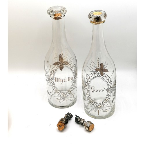 383 - Meriden Brandy / Whisky / Rum decanter set on a plated spirit bottle carrier with a parrot finial to... 