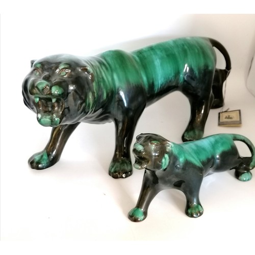 388 - Blue Mountain pottery pair of tigers - largest nearly 18