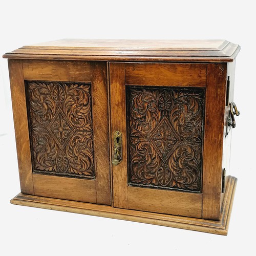 12 - Oak 2 door fitted smokers cabinet with a lift up lid - height 10½