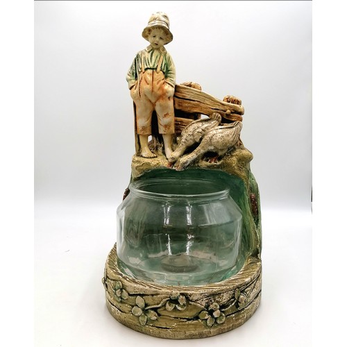 15 - C1940's plaster figure of a boy w/ geese looking into a fish bowl, 20