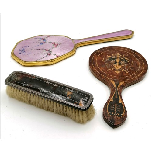 17 - Silver and tortoiseshell backed clothes brush, a marquetry hand mirror and an enamel backed hand mir... 