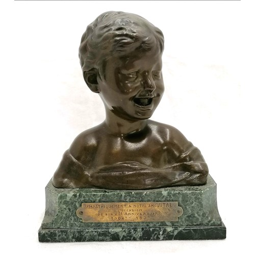 79 - Bronze bust of a laughing child with a presentation plaque to the front on a marble base signed on r... 