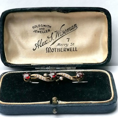 166 - Antique 9ct gold garnet & seed pearl brooch in original box