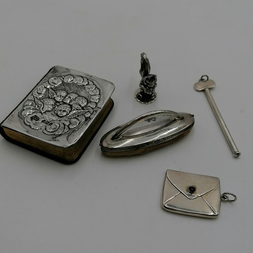 258 - Silver pipe pick, nail buffer, envelope stamp holder, common prayer book (with silver front cover) &... 