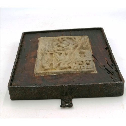 348 - Antique stone tablet in a later wooden and cast iron frame. 9.5