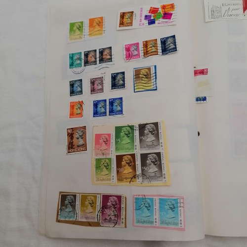 376 - 3 x albums full of used worldwide stamps