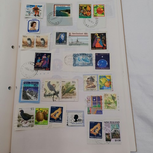 376 - 3 x albums full of used worldwide stamps