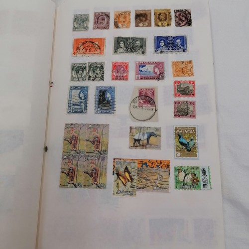 376 - 3 x albums full of used worldwide stamps