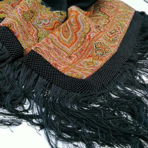 407 - Large antique fringed wool shawl w/ paisley border size is 57