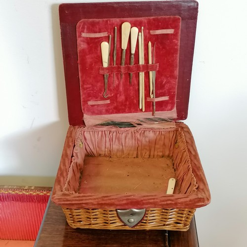 527 - Vintage oak sewing box on wheels t/w a sewing basket, 19