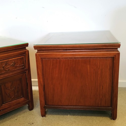 544 - Pair of Chinese hardwood side cabinets with single over a 2 door cupboard with carved fronts and gla... 