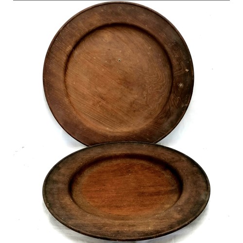 556 - Pair of teak hand turned wooden platters (20